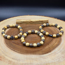 Load image into Gallery viewer, Bracelet - Palo Santo with Evil Eye Patterned Tibetan Agate (Olive Green)
